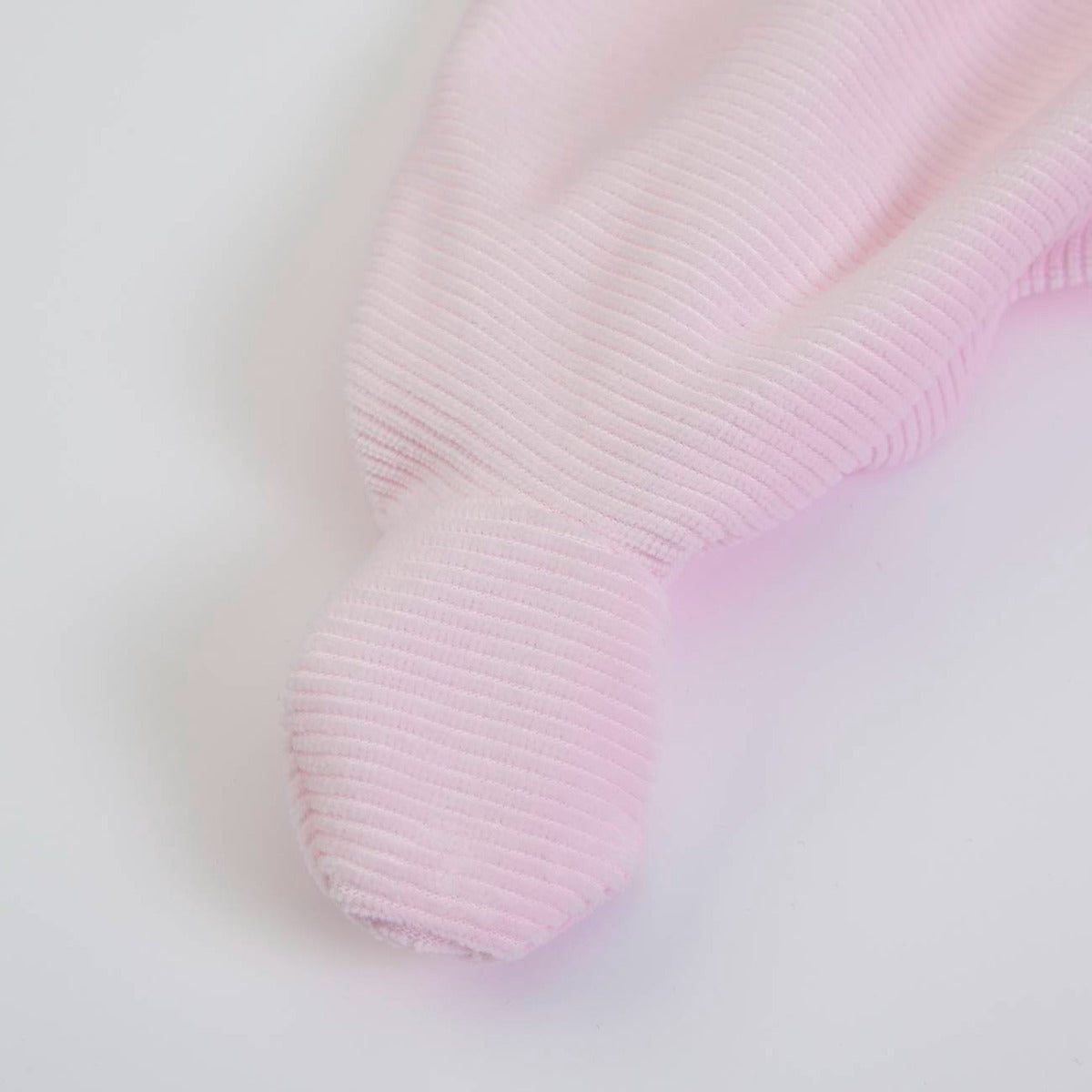 Tutina Neonato Nascita Femminuccia in Ciniglia Rosa - piedino