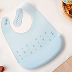 Bavaglino in silicone con tasca - Celeste
