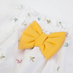 PAGLIACCETTO NEONATA BAMBINA MEZZA MANICA "FIORI" - Dettaglio fiocco culottes